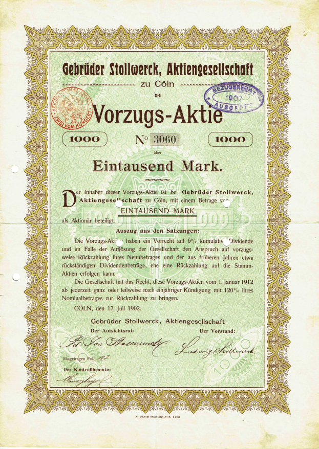 Ein altes deutsches Aktienzertifikat mit grünem Hintergrund, goldener Umrandung, gedrucktem Text und einem Stempel.