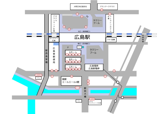 Eine detaillierte Stadtkarte mit einem weißen Hintergrund, die den Standort eines Bahnhofs, Straßen, Gebäude und Sehenswürdigkeiten zeigt, mit fettem, lesbaren Text.