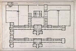 Schwarz-weißer architektonischer Grundriss eines großen Gebäudes mit zahlreichen beschrifteten Räumen, darunter ein Abschnitt, der als Irrenhaus für Kriminelle bezeichnet ist.