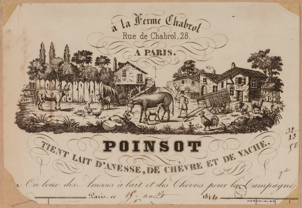 Ein altes Buch mit einer Zeichnung einer Farmszene mit Häusern, Bäumen, Tieren, Menschen und einem Wagen darauf, mit etwas Schrift auf der Seite.