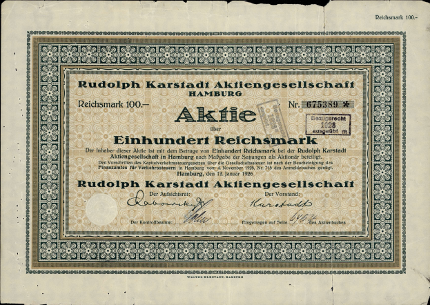 Ein altes deutsches Banknoten mit einem schwarzen Hintergrund und dem Text "Rudolph Karlstadt Aktiengesellschaft Hamburg" darauf.